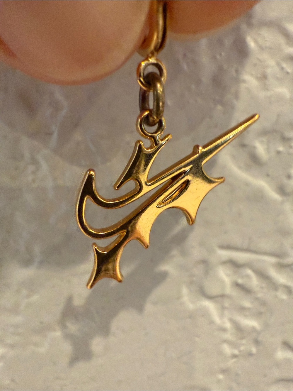 Nike Spike Pendant Charm